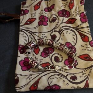 Elegant Silver and Red Beaded Bracelet